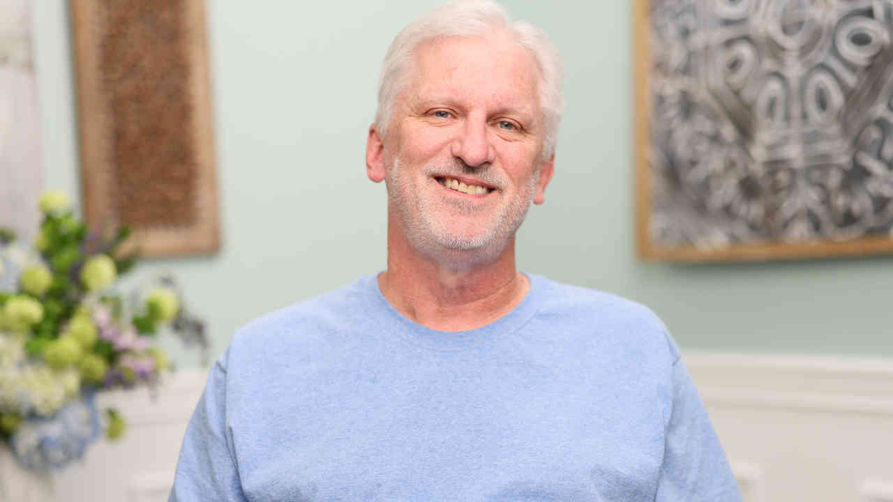 portrait image of joe after dental implants