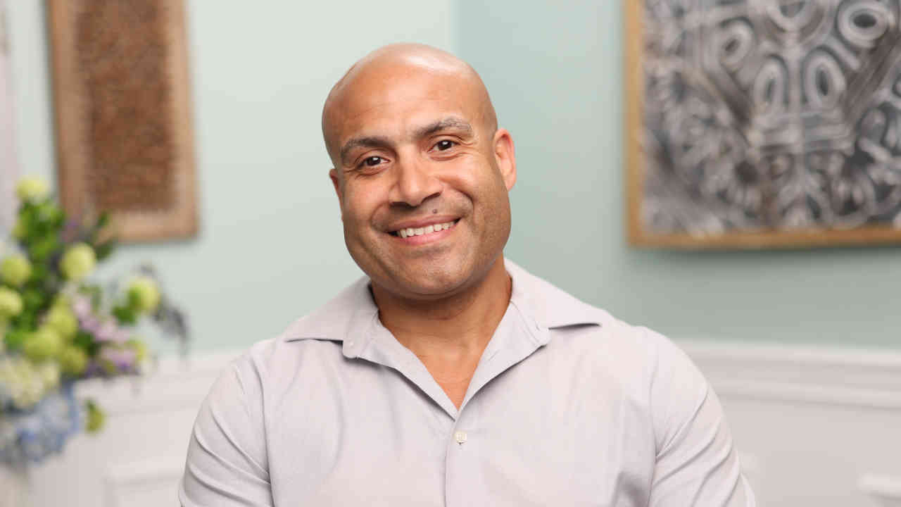 portrait image of lamont after dental implants