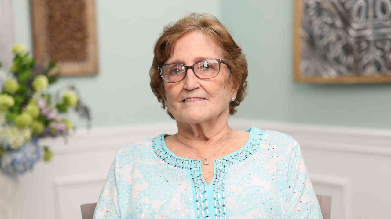 portrait image of myrna after oral surgery