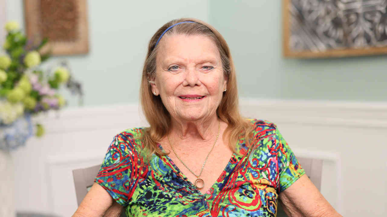 portrait image of patsy after dental implants