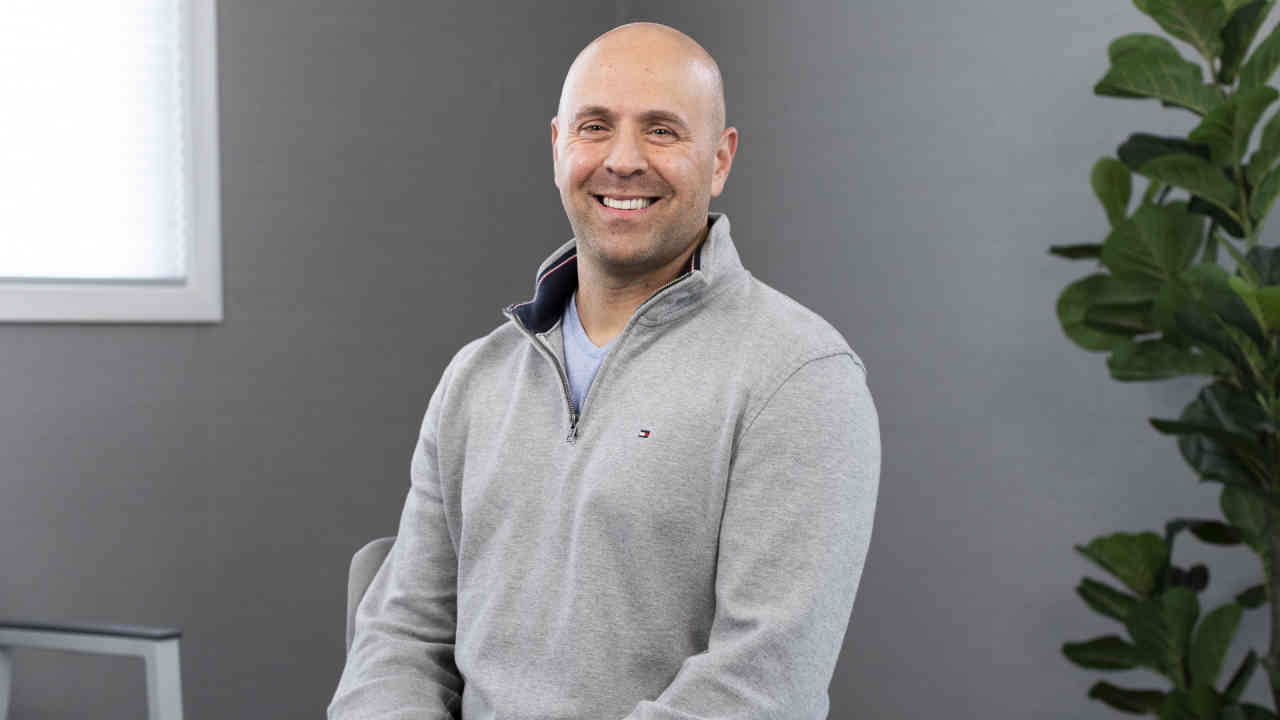 portrait image of darren after dental implants