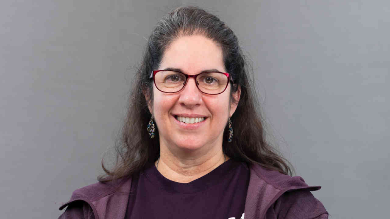 portrait image of debra after tooth extraction
