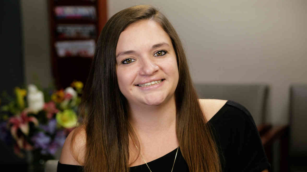 portrait image of erika after dental implants