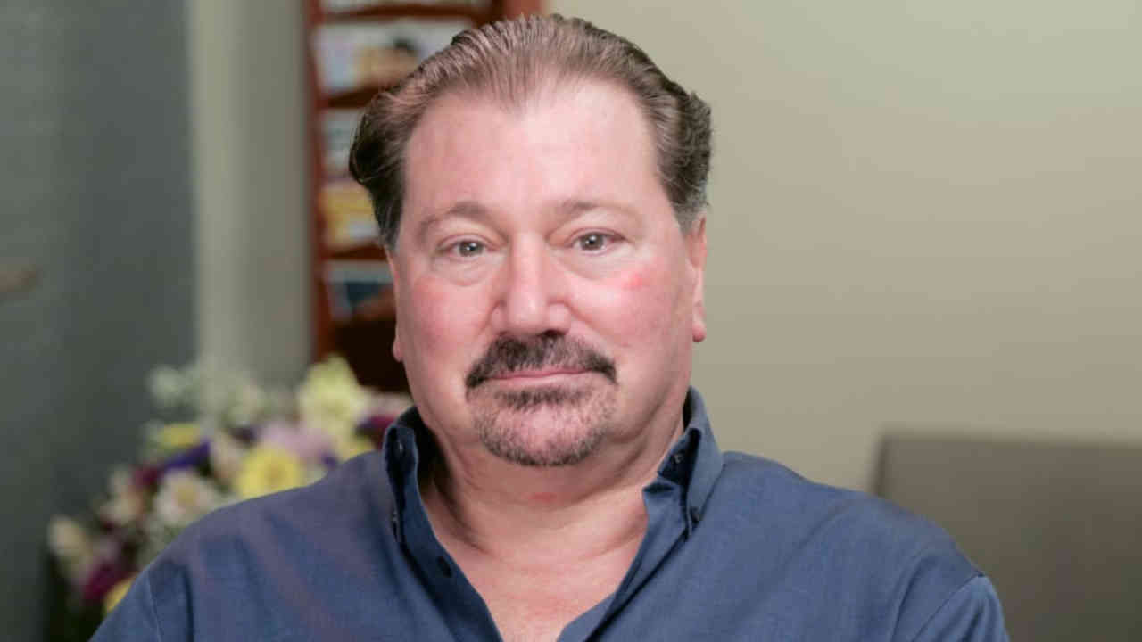 portrait image of frank after dental implants