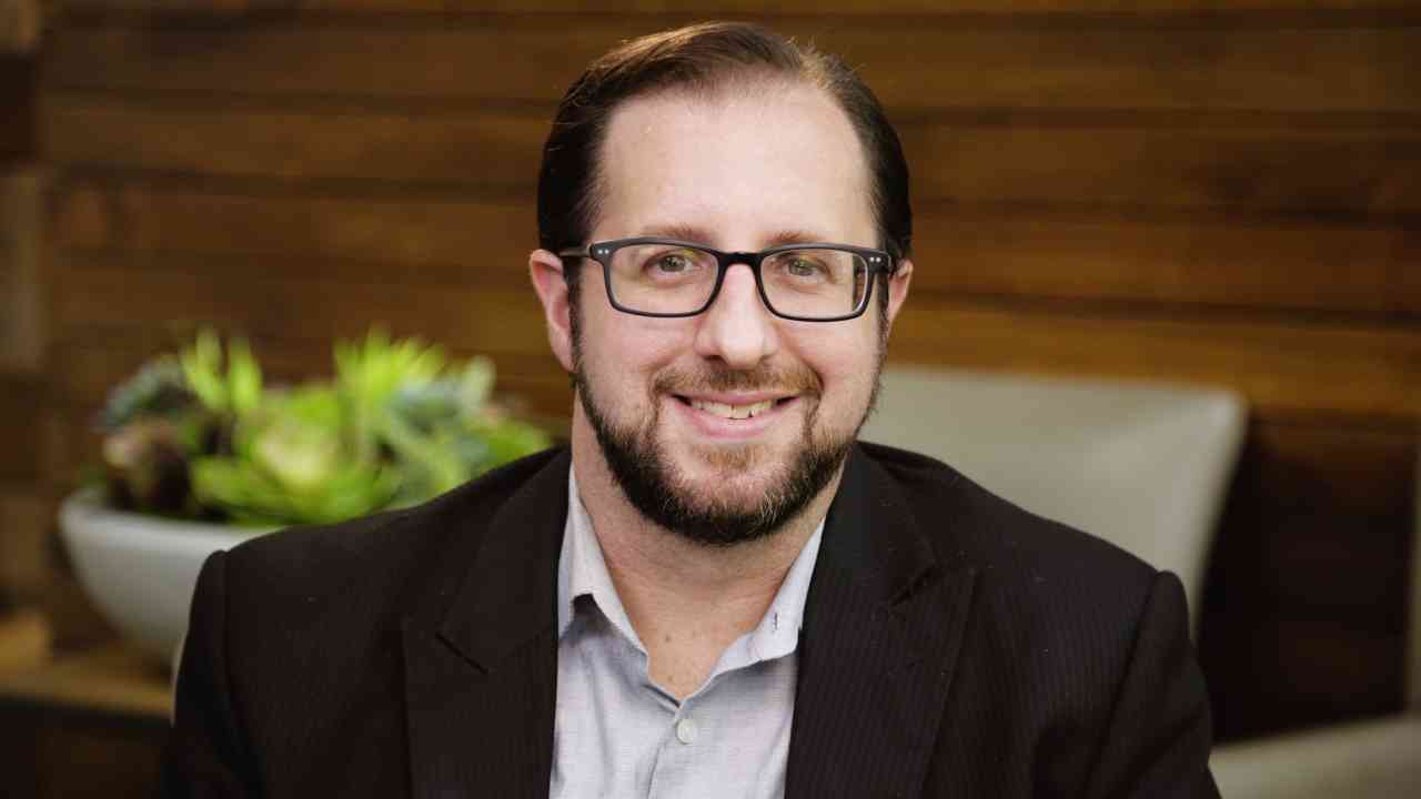 portrait image of daniel after dental implants