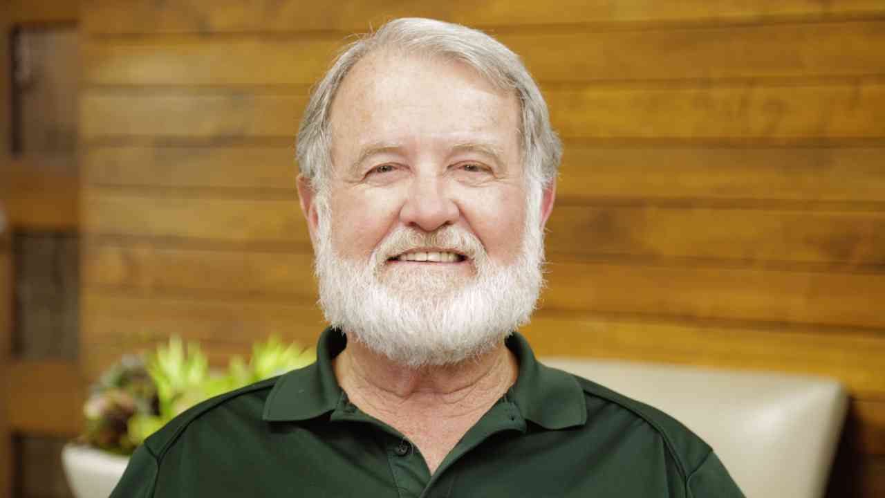 portrait image of gene after dental implants