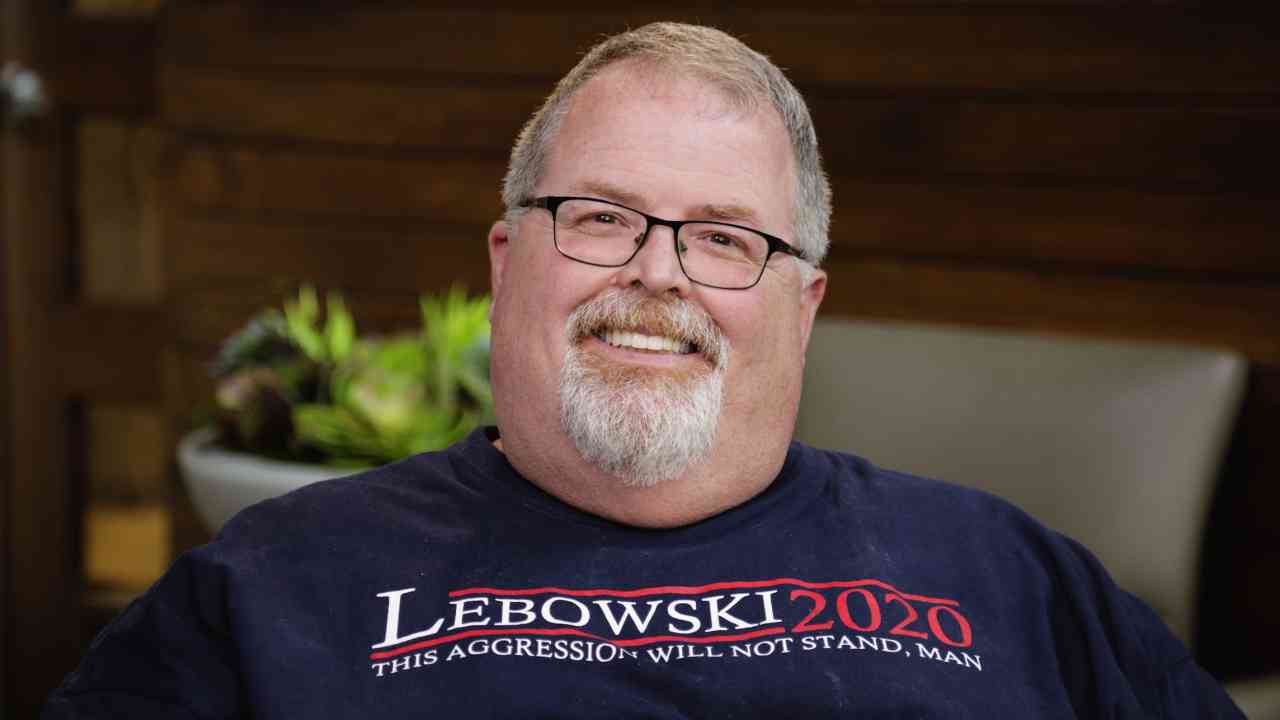 portrait image of greg after full-arch restoration