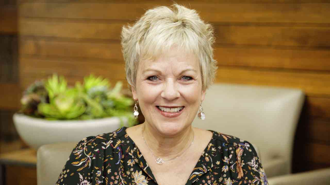 portrait image of hope after dental implants