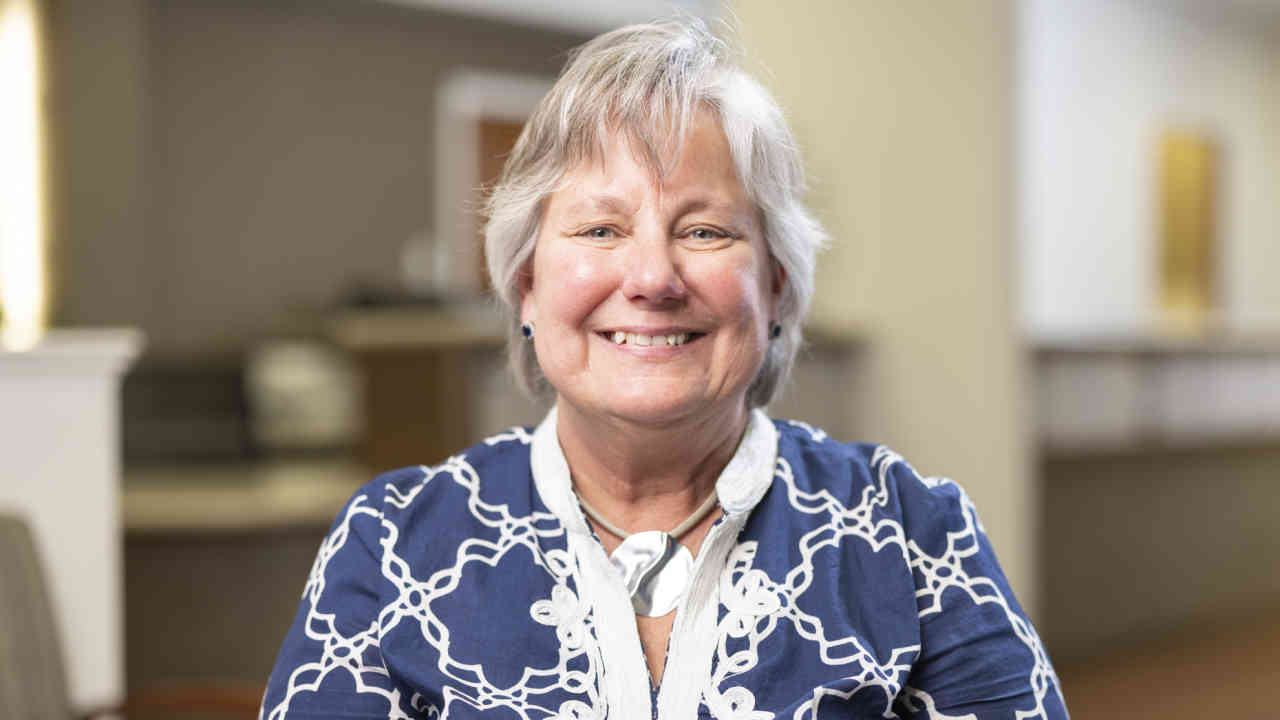 portrait image of Mary after Dental Implants