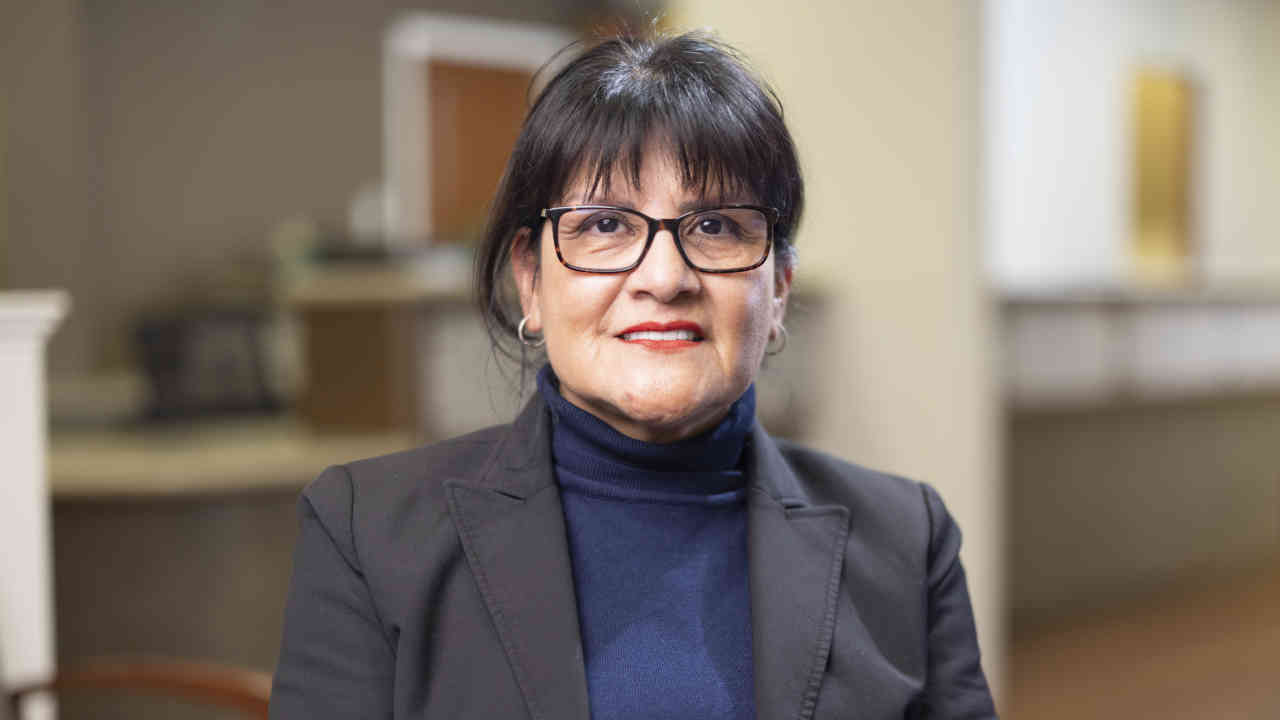 portrait image of Irma after Dental Implants