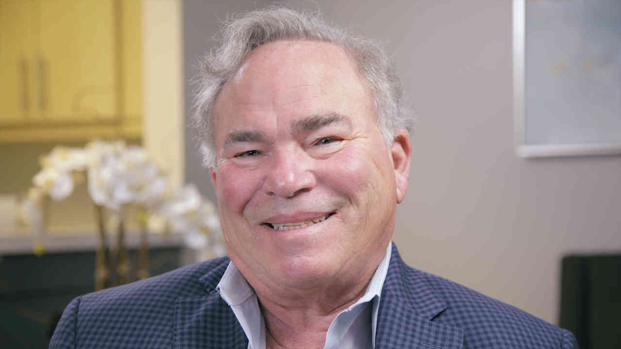 portrait image of Joe after Dental Implants