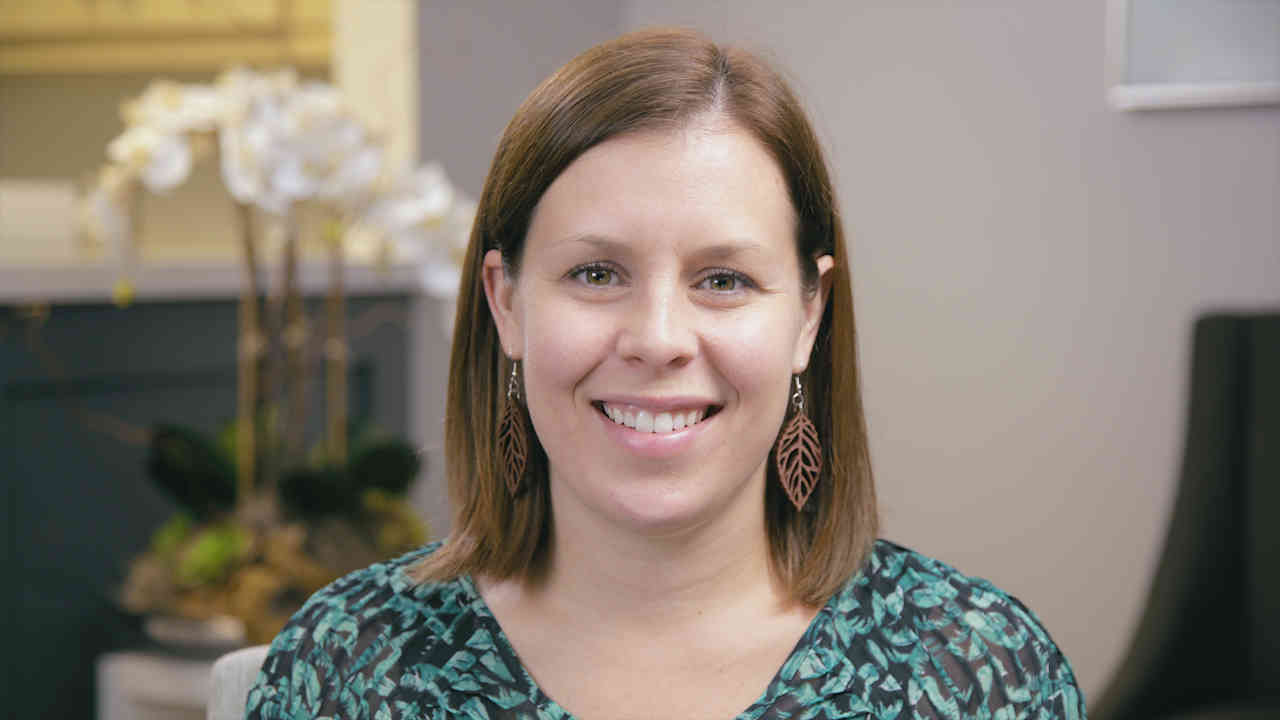 portrait image of Katie after Dental Implants