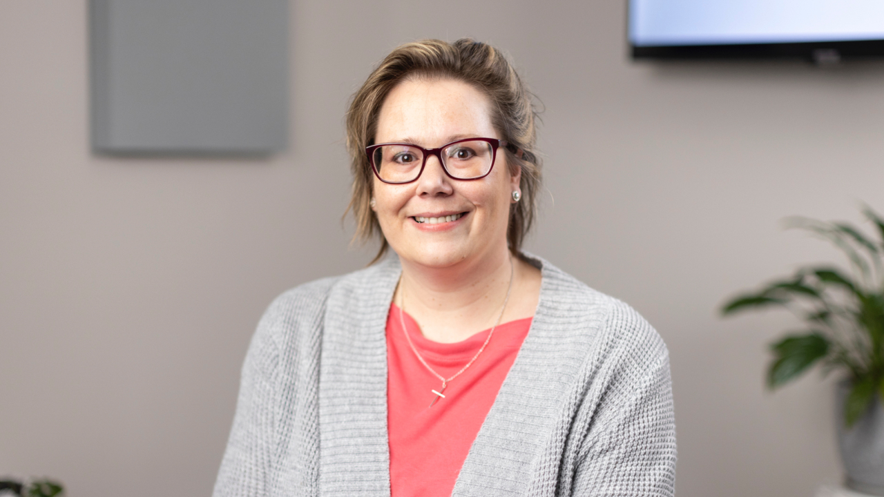 portrait image of alison after dental implants