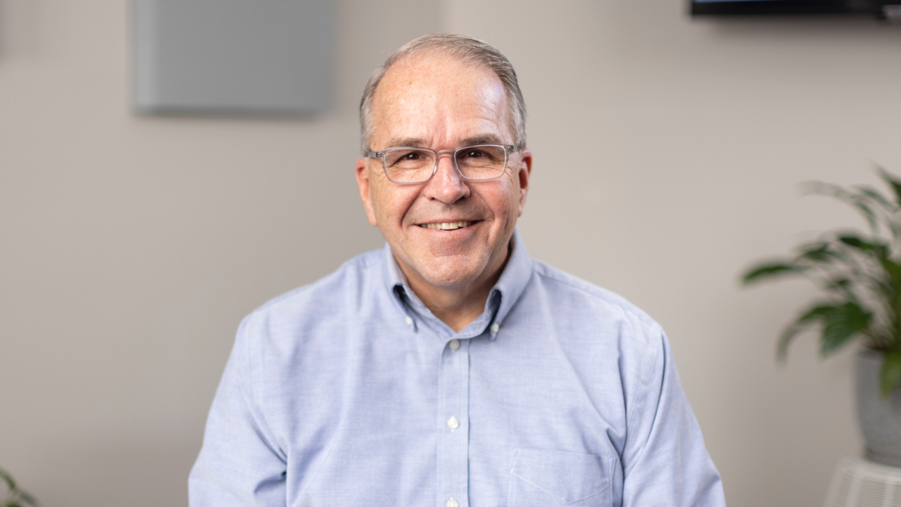 portrait image of bill after dental implants