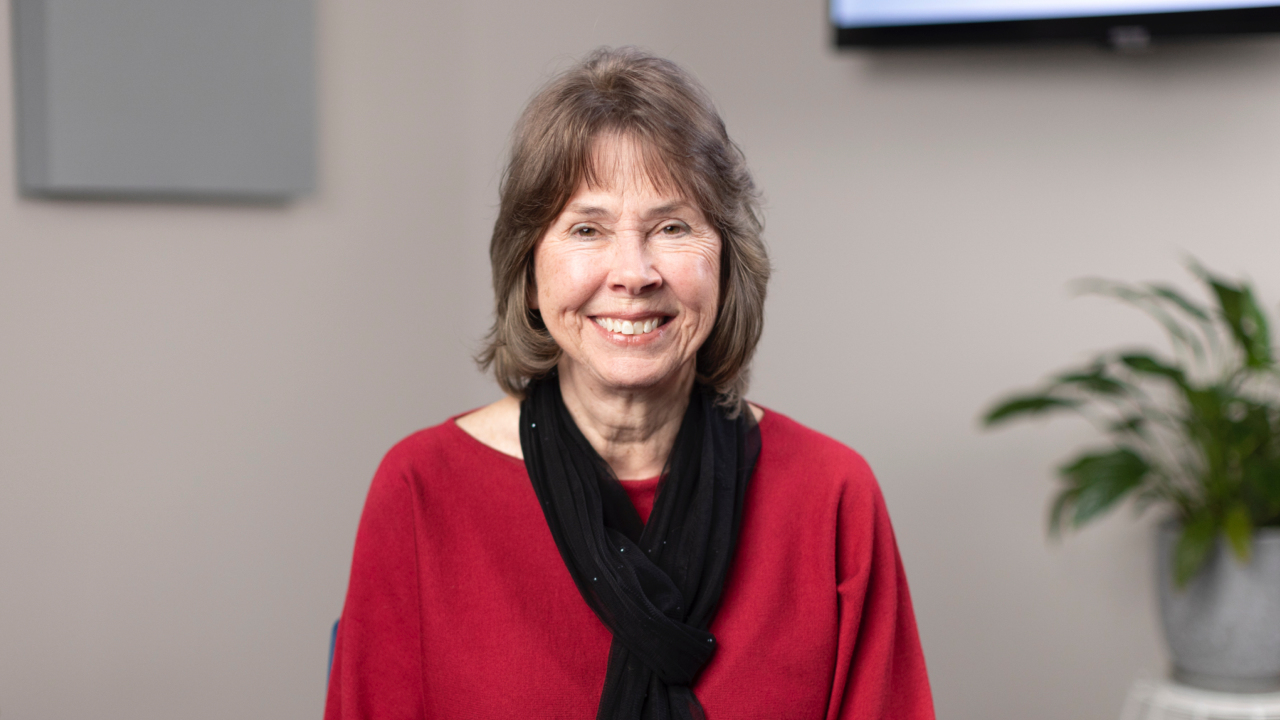 portrait image of elaine after dental implants