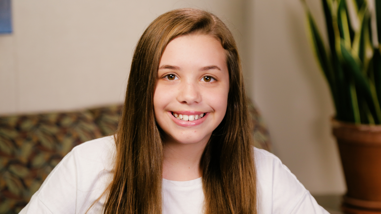 portrait image of eliza after tooth extractions