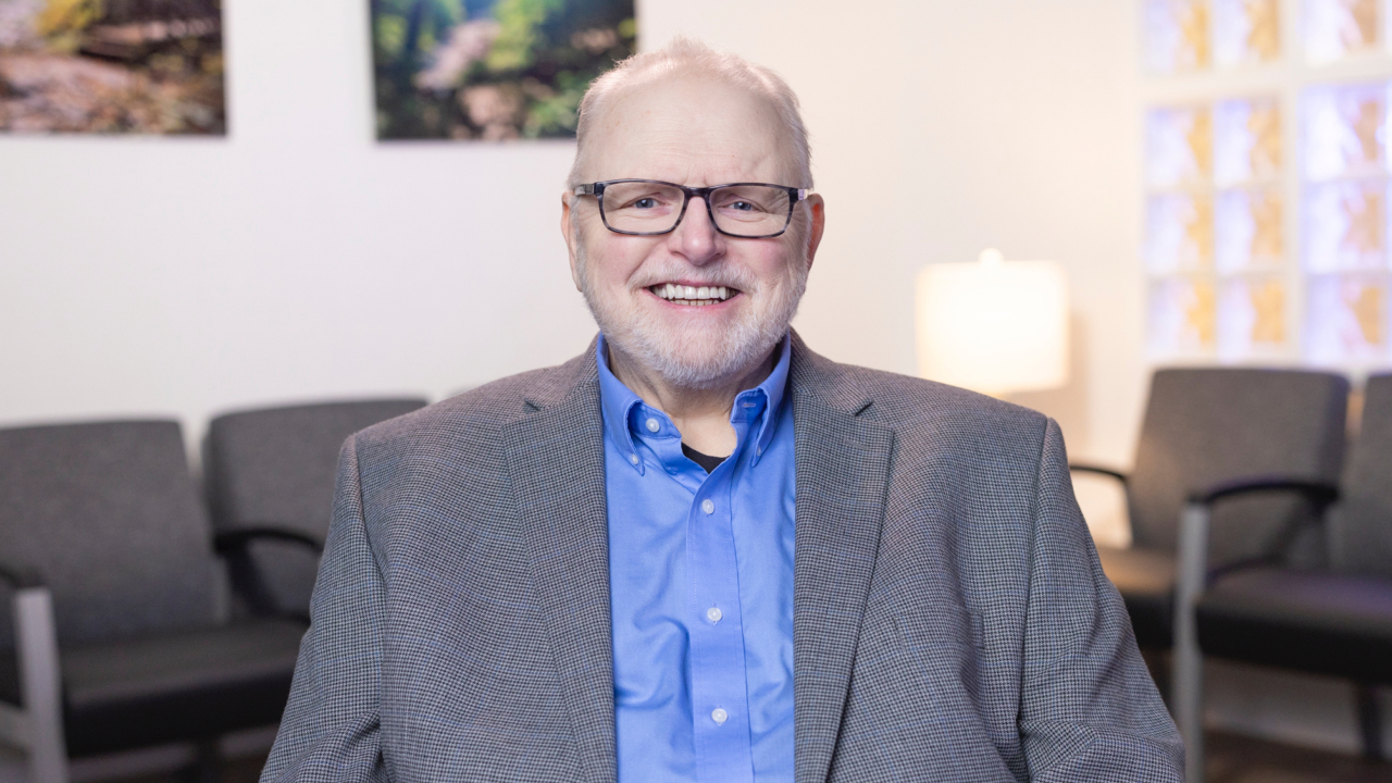 portrait image of charles after dental implants
