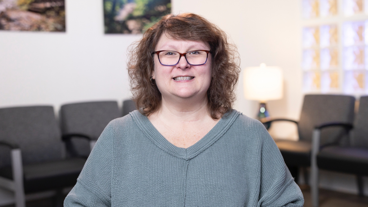 portrait image of kristi after dental implants