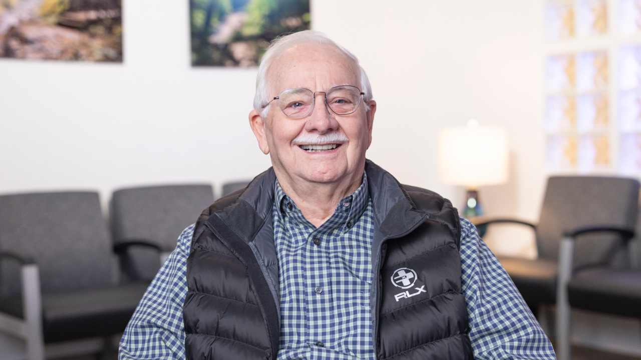 portrait image of lonnie after dental implants