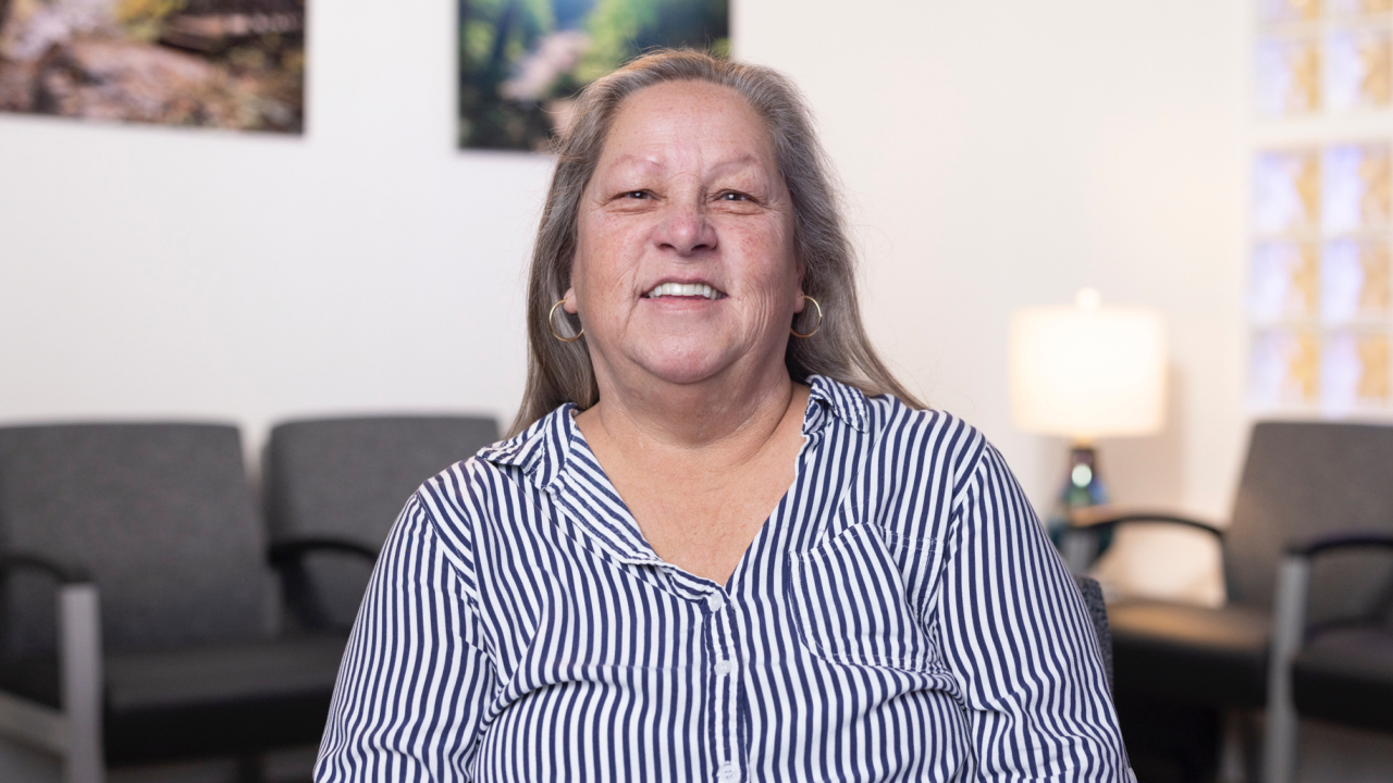 portrait image of vanessa after dental implants