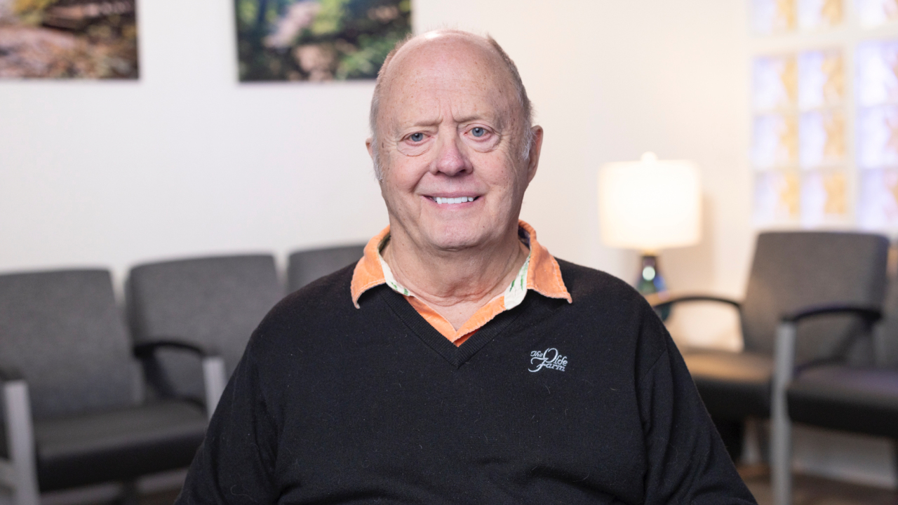 portrait image of dr. tiller after dental implants