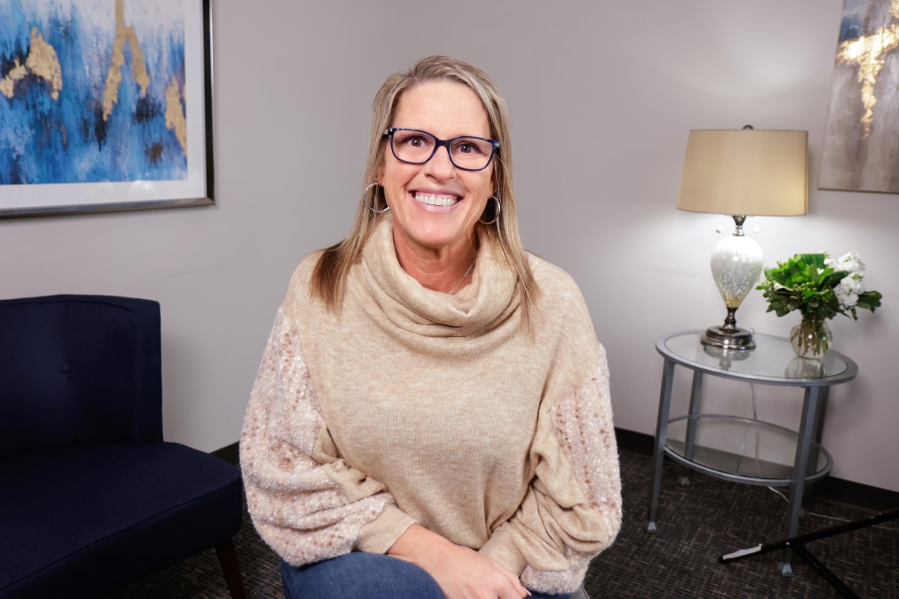 portrait image of colleen after dental implants