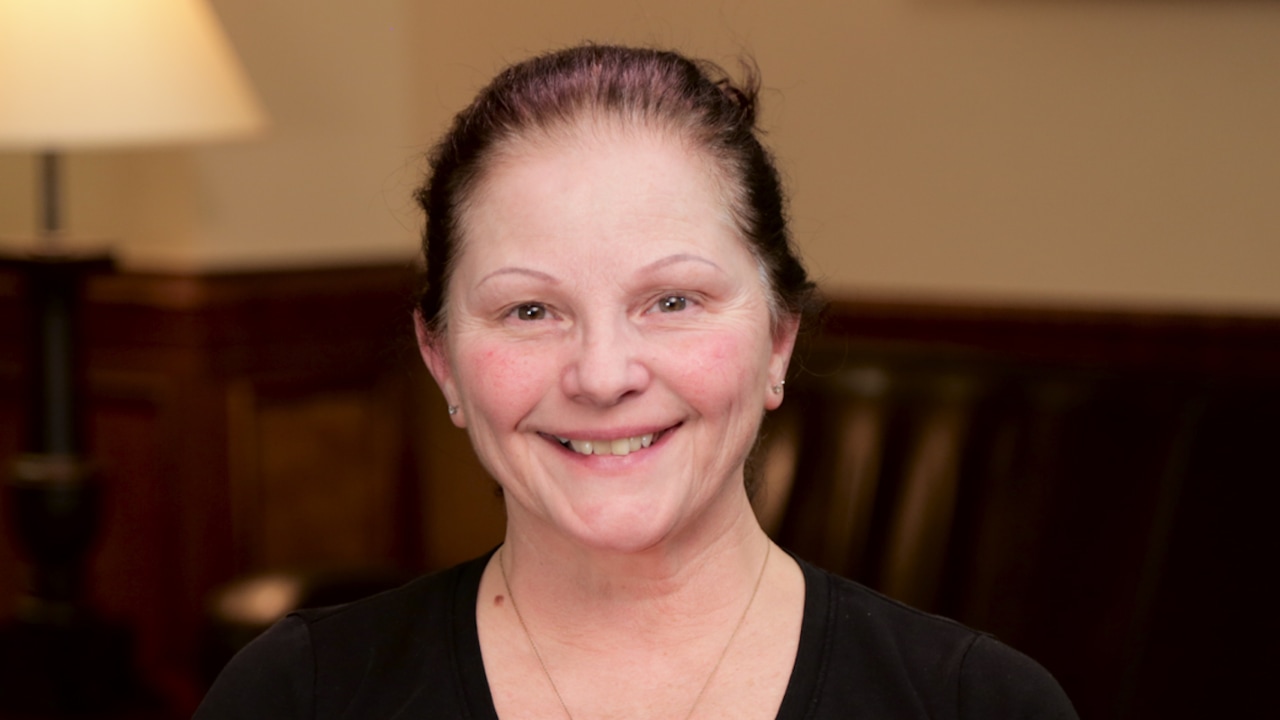 portrait image of brenda after dental implants