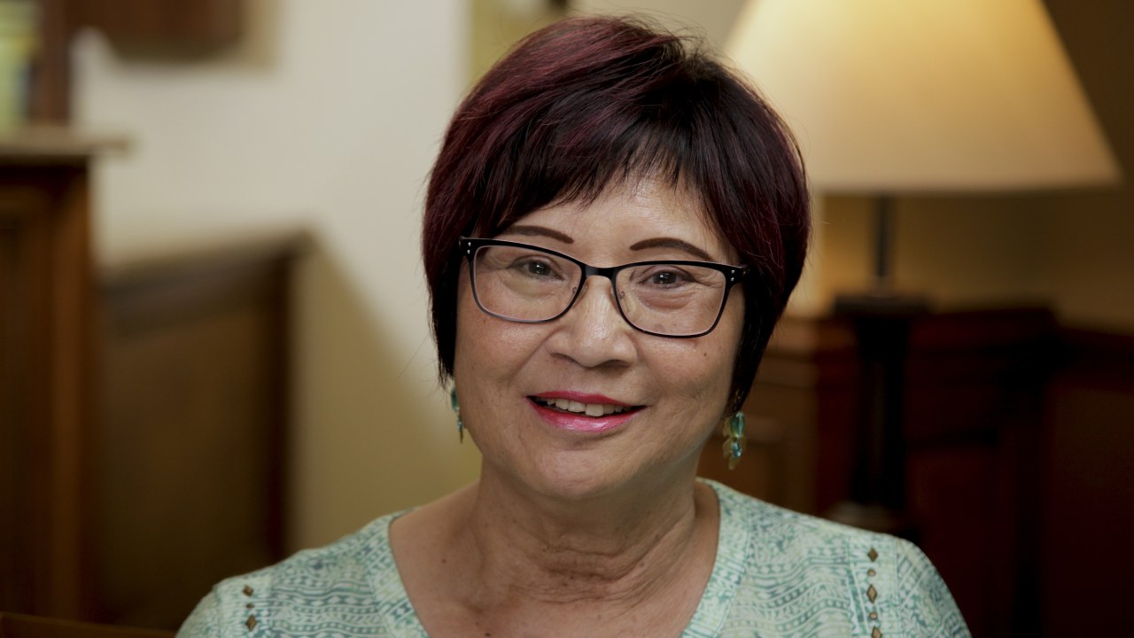 portrait image of darlene after dental implants