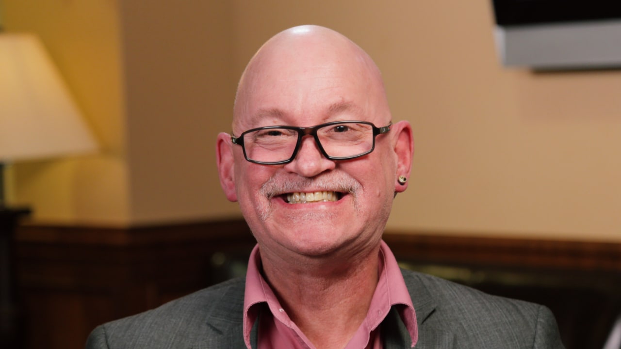 portrait image of don after dental implants