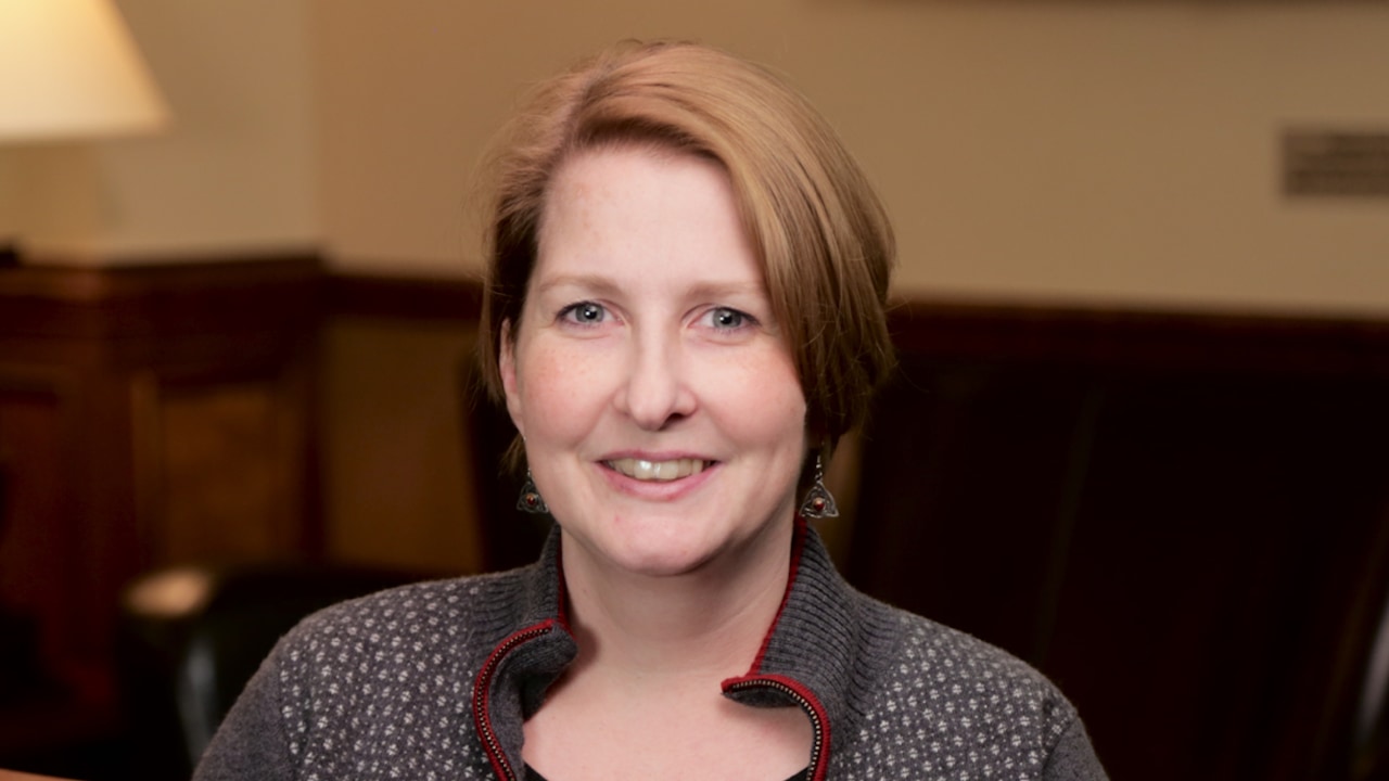 portrait image of heather after dental implants