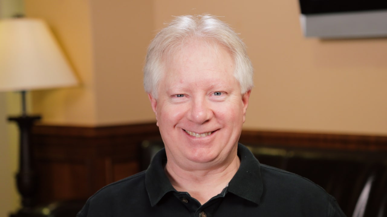 portrait image of james after dental implants