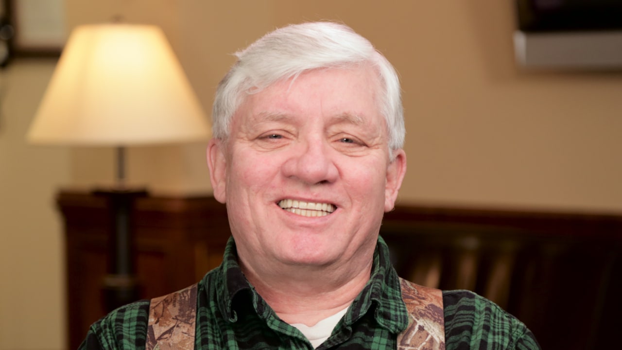 portrait image of michael after full-arch restoration