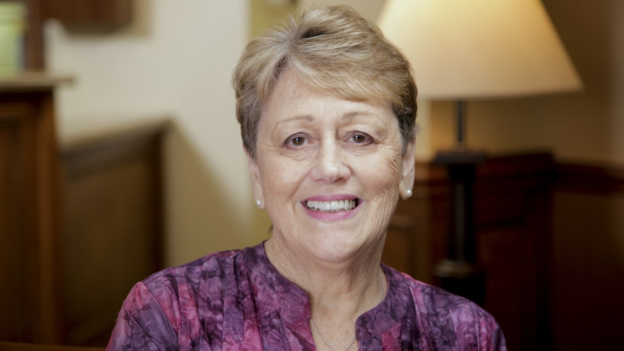 portrait image of sue after dental implants