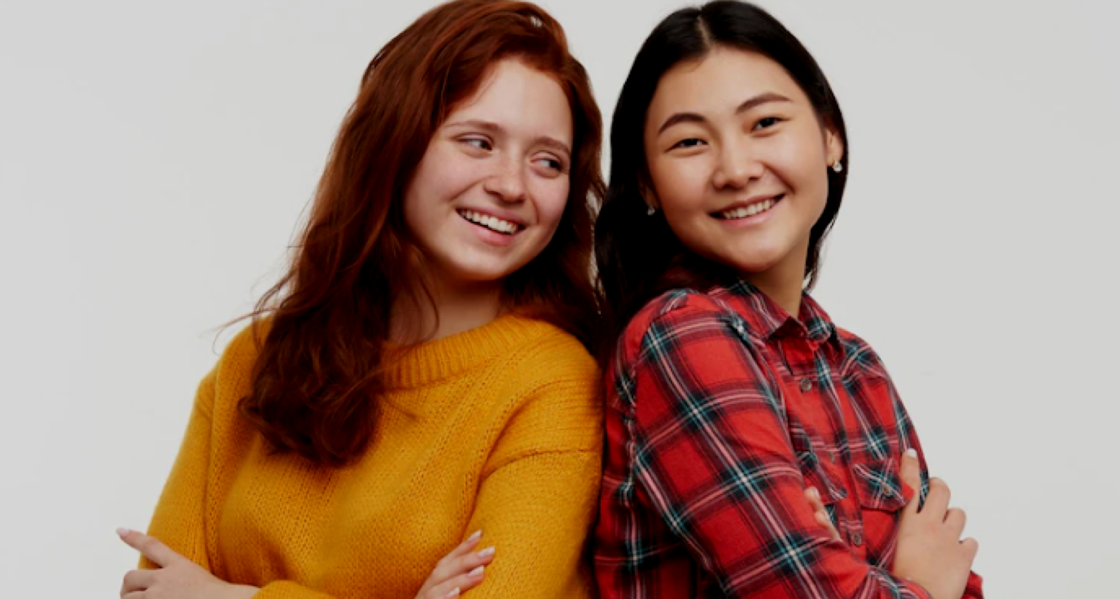 two girls smiling