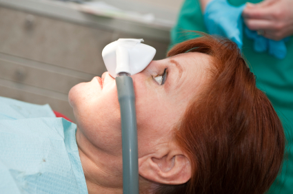 A woman undergoing sedation dentistry. A woman undergoing sedation dentistry.