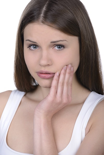 A girl suffering from a severe overbite. A girl suffering from a severe overbite.