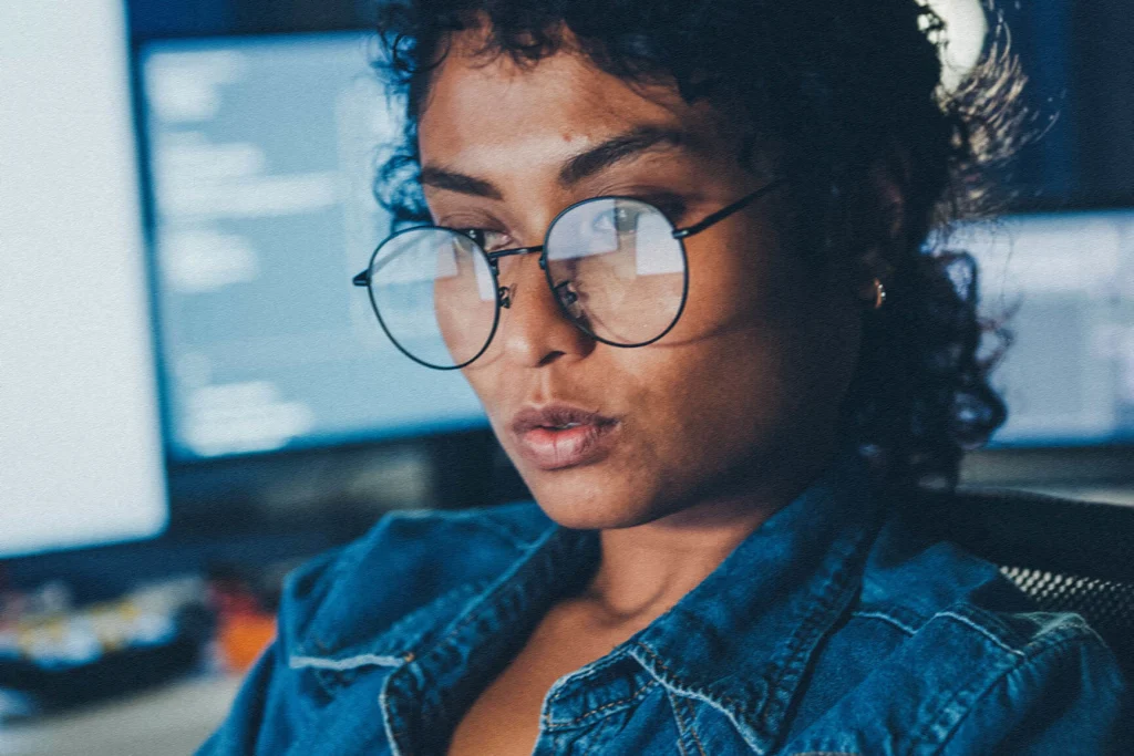Woman looking at a computer screen