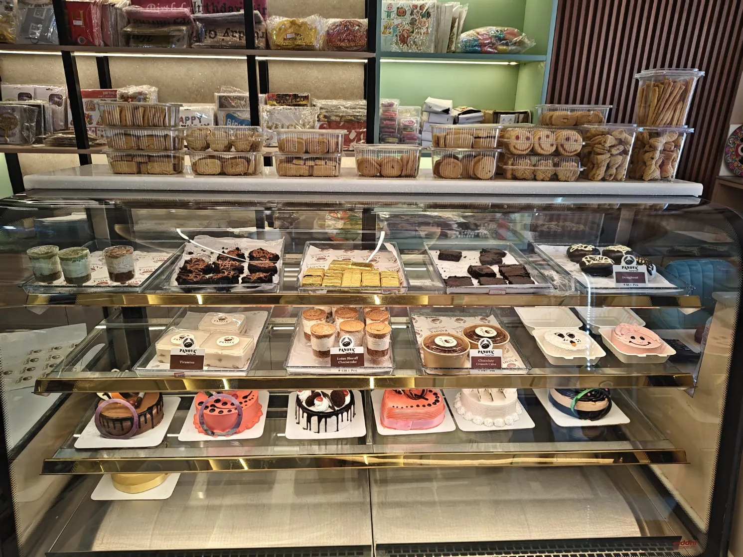 PANOVA fresh celebration cakes, Lotus Biscoff cheesecake, and desserts in counter