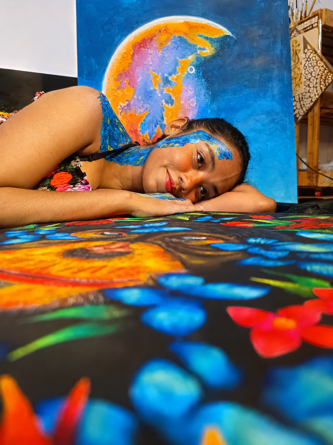 Zahara painting in her studio