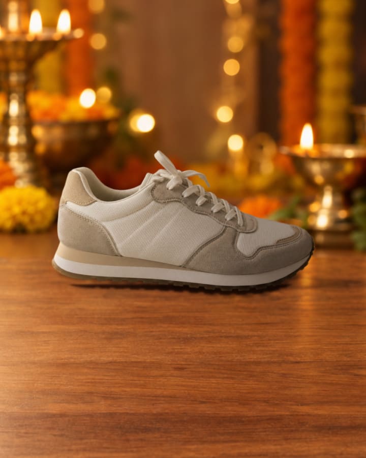Casual sneaker, white · mesh, staged in a diwali glow scene