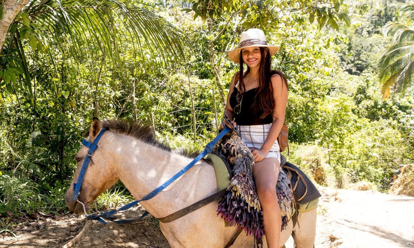 on horseback on the trail to El Limón Waterfall