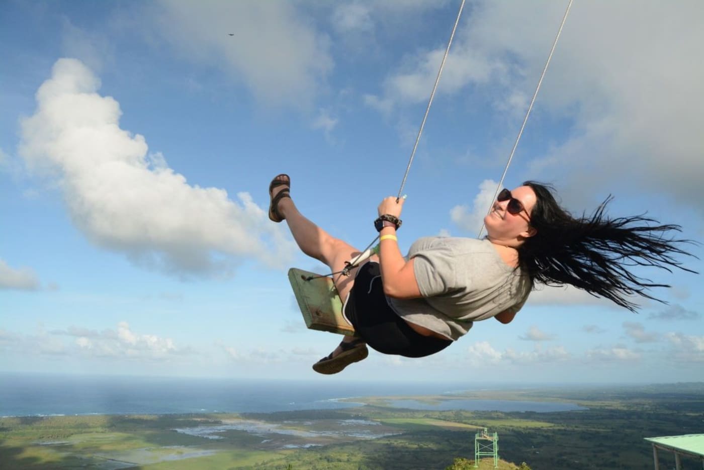 Couple on the Montaña Redonda swing before the horseback ride