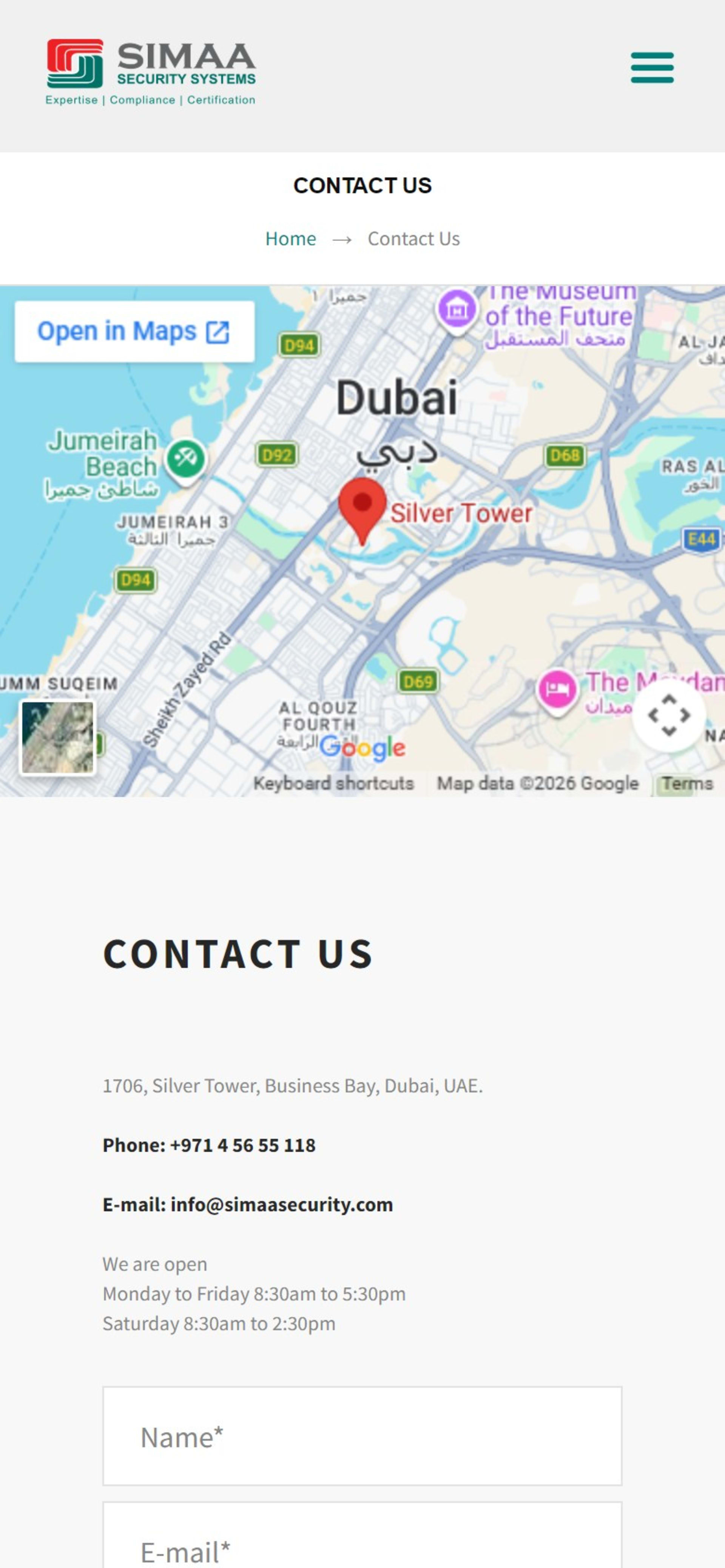 WordPress website for Simaa Security Systems, a Dubai ELV integrator, On a phone: the contact page with the map, phone, email and opening hours