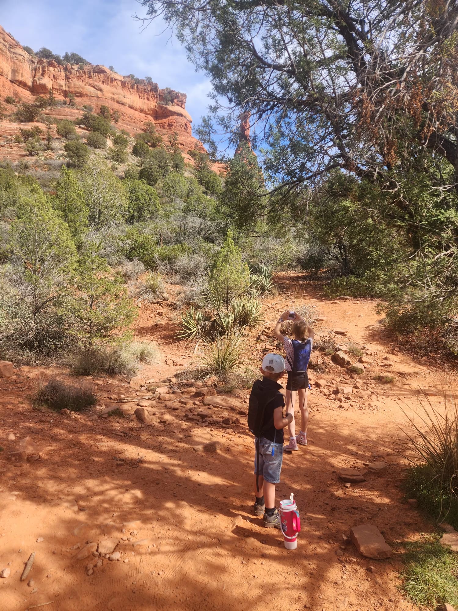 Family spending time among the red rocks near Sedona, Arizona