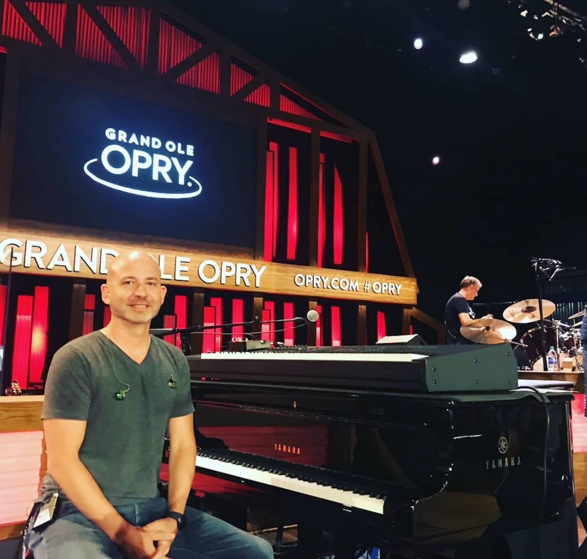Dave LaGrande performing piano on stage