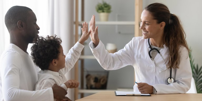 oag-patients-hero-female-doctor-high-fiving-daughter-and-father