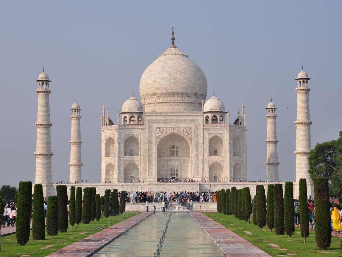 Full Day Exploration of Agra with Sunrise at the Taj Mahal. Evening Train to Delhi