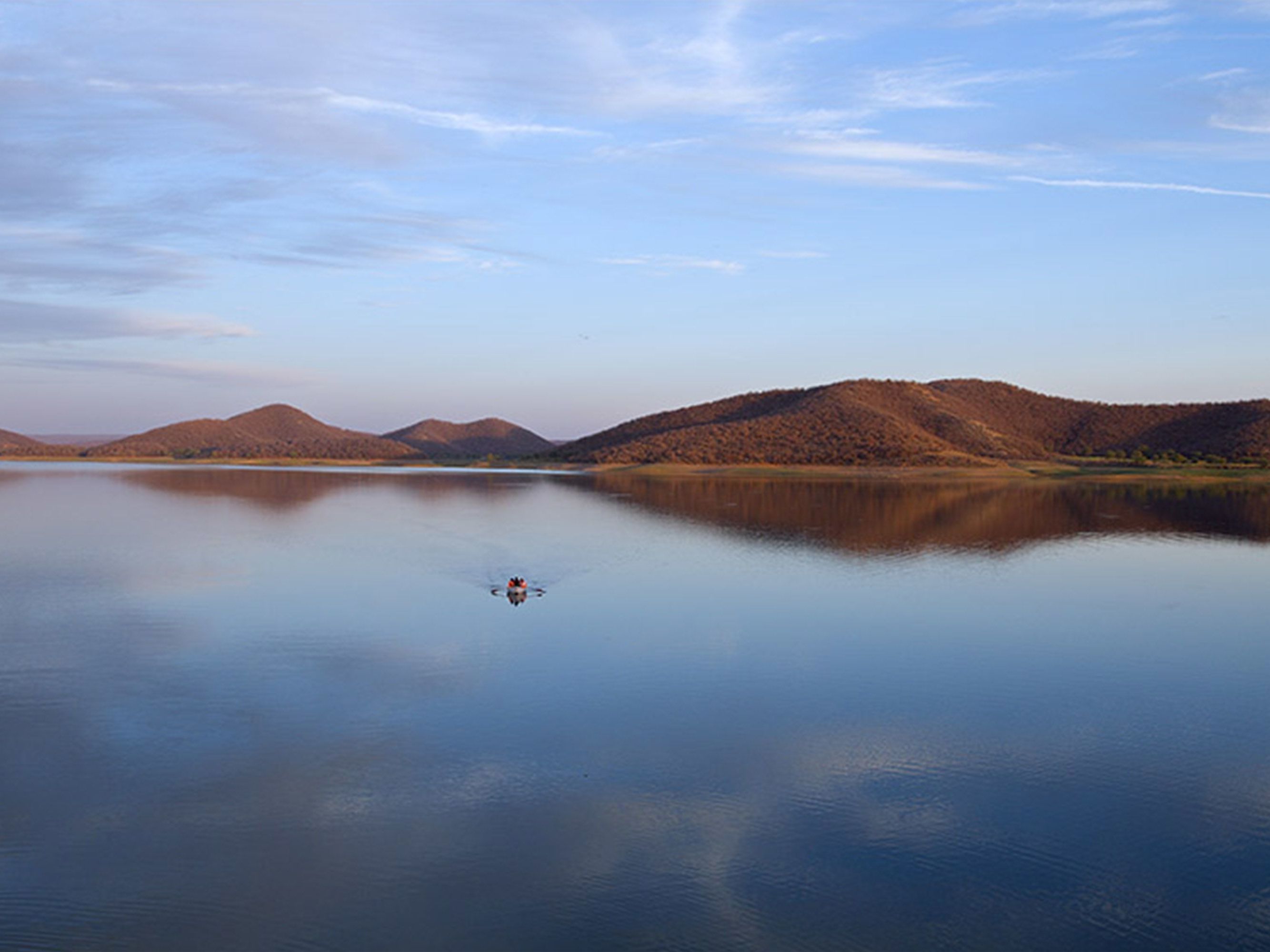 Boat Ride on Kalisil Lake and Evening Safari