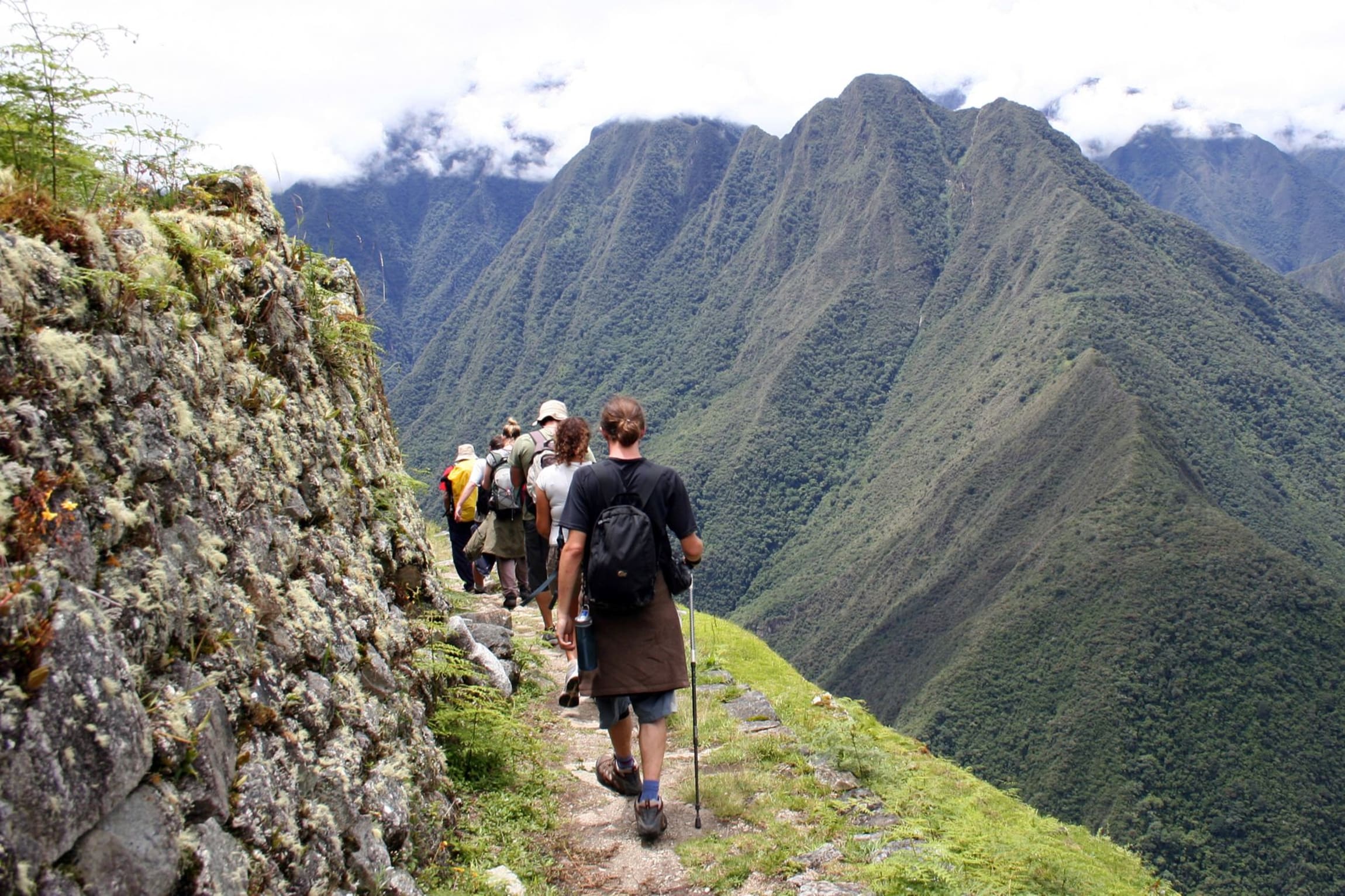 Group of hikers trekking the Inca Trail in Peru on a guided Inca Trail tour