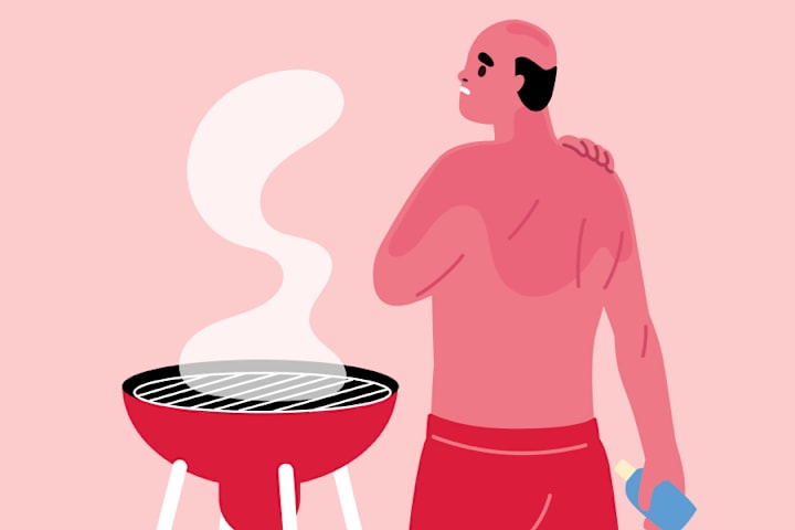 En mann griller og er solbrent